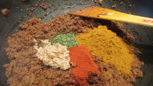 Add GG paste, Methi, Mix powder, chilli powder. Stir in to roast them.
