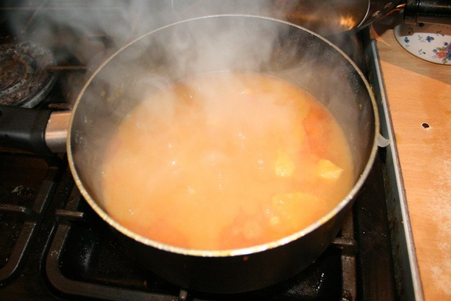 Chicken cooking in base gravy